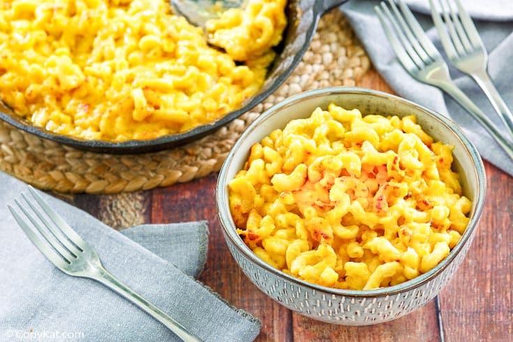 homemade Stouffers Mac and Cheese in a blue bowl and baking dish
