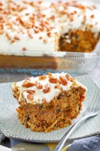 a slice of carrot cake with cream cheese frosting