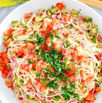 homemade Luby's spaghetti salad in a white serving bowl
