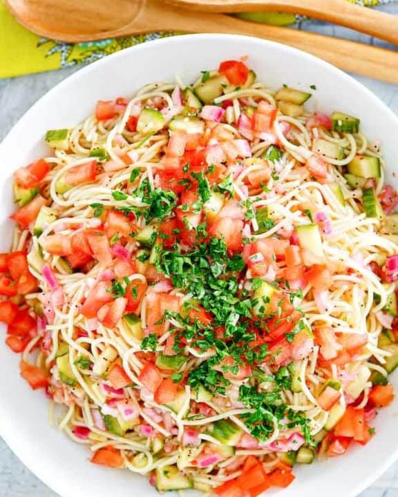 homemade Luby's spaghetti salad in a white serving bowl