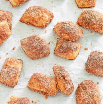 homemade cinnamon sugar pretzel bites on parchment paper