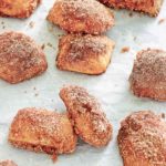 cinnamon sugar pretzel bites on parchment paper