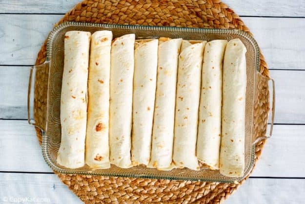 cream cheese enchiladas in a baking dish