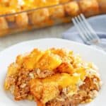 a serving of hamburger tater tot casserole on a white plate