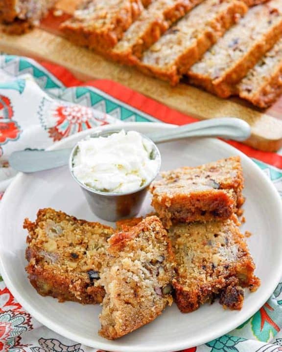 slices of rhubarb bread on a plate and cutting board
