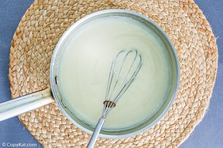 coconut cream pie filling in a pan