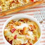 hot German potato salad in a bowl and baking dish