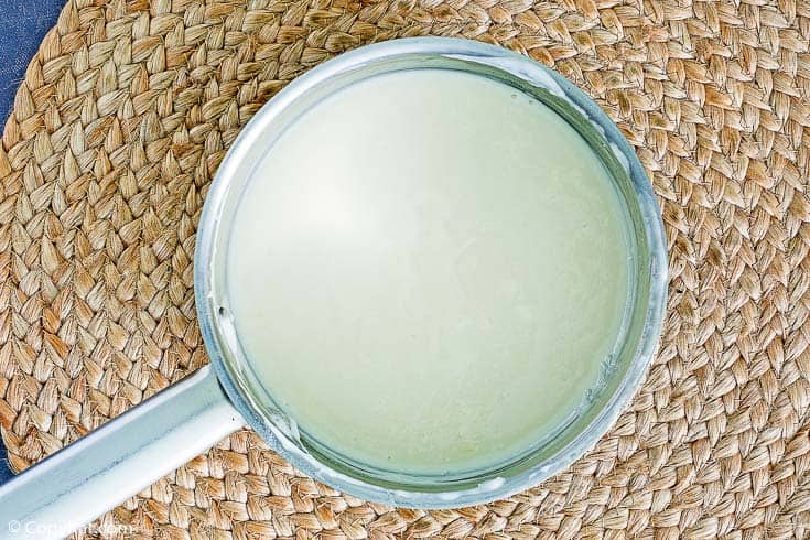 sour cream custard topping in a pan