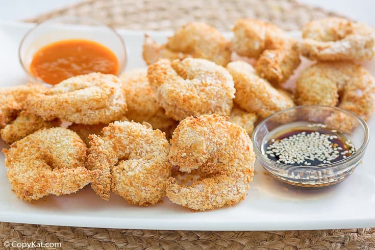 air fried panko breaded shrimp and dipping sauces on a platter