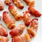 brown sugar bacon wrapped little smokies on a platter