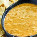 chili con queso dip and tortilla chips