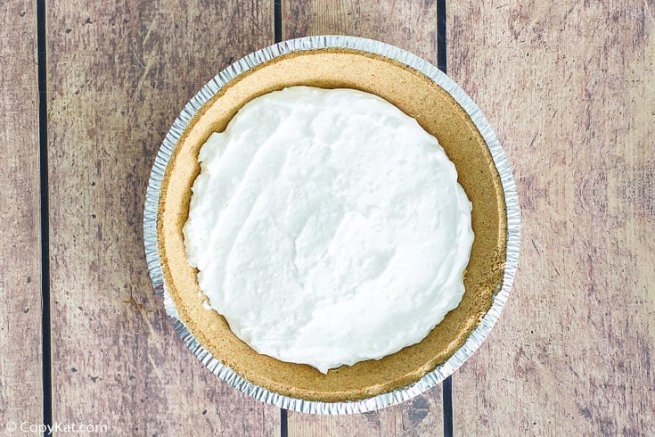 cheesecake layer in a graham cracker crust