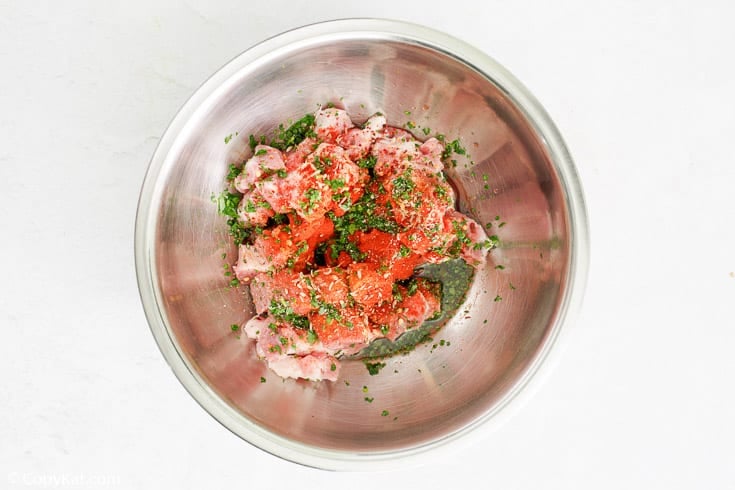 Homemade Italian sausage ingredients in a mixing bowl