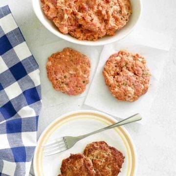 overhead view of homemade Italian sausage in a bowl and patties