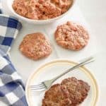 homemade Italian sausage in a bowl and patties