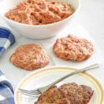 homemade Italian sausage in a bowl and patties