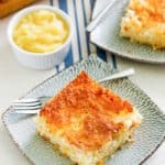 two slices of pineapple angel food cake and a bowl of crushed pineapple