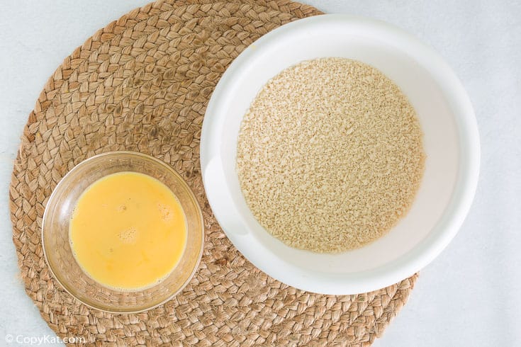 egg wash and panko bread crumbs in bowls