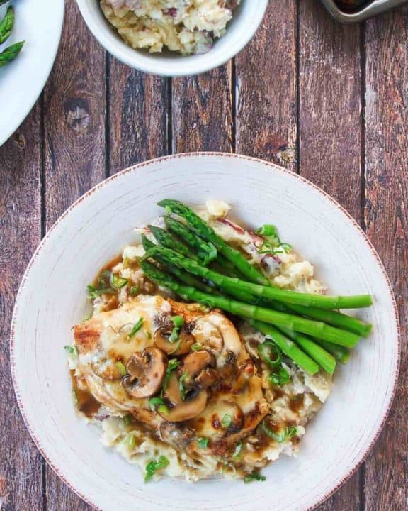 chicken madeira with mashed potatoes and asparagus