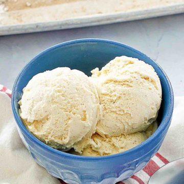 the scoops of cake batter ice cream in a blue bowl