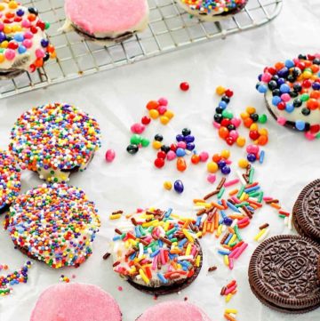 white chocolate covered oreos topped with sprinkles
