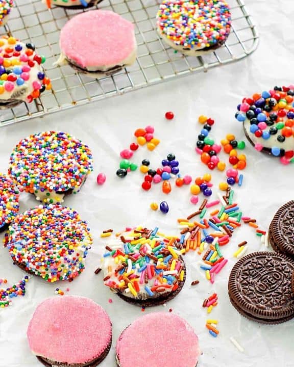 white chocolate covered oreos topped with sprinkles