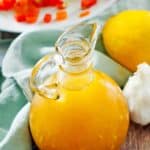 homemade French salad dressing in a small pitcher