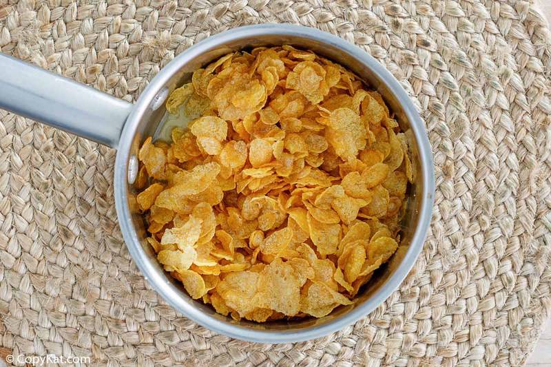 corn flakes and melted butter in a saucepan