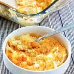 cheesy hashbrown potato casserole in a bowl and baking dish