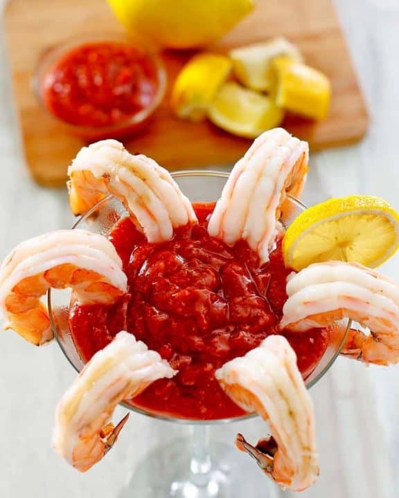 shrimp and homemade cocktail sauce in a martini glass