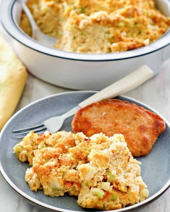 southern cornbread dressing on a plate and in a baking dish