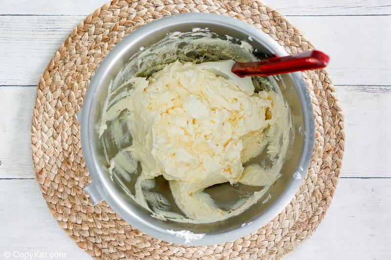 ambrosia cake frosting in a mixing bowl
