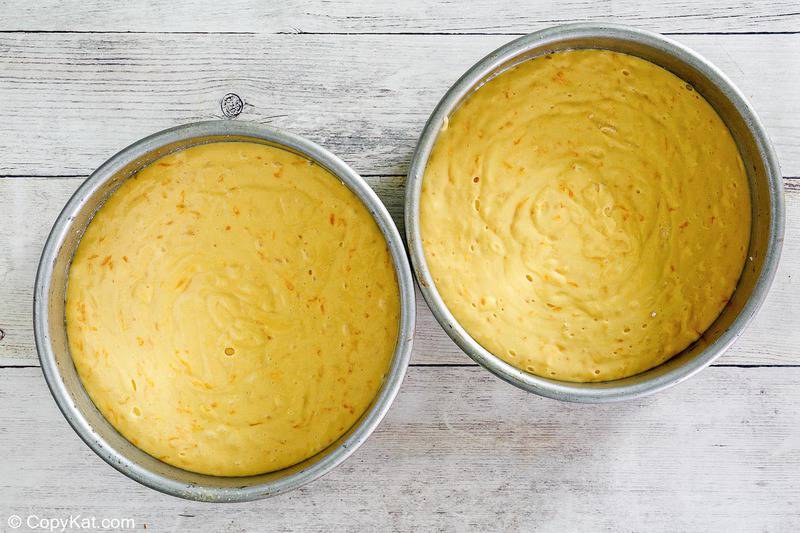 ambrosia cake layers in cake pans