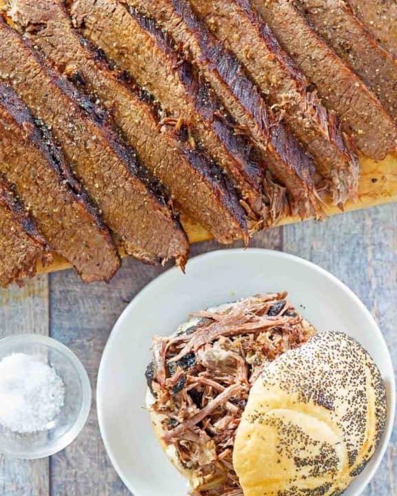 overhead view of brisket slices and sandwich