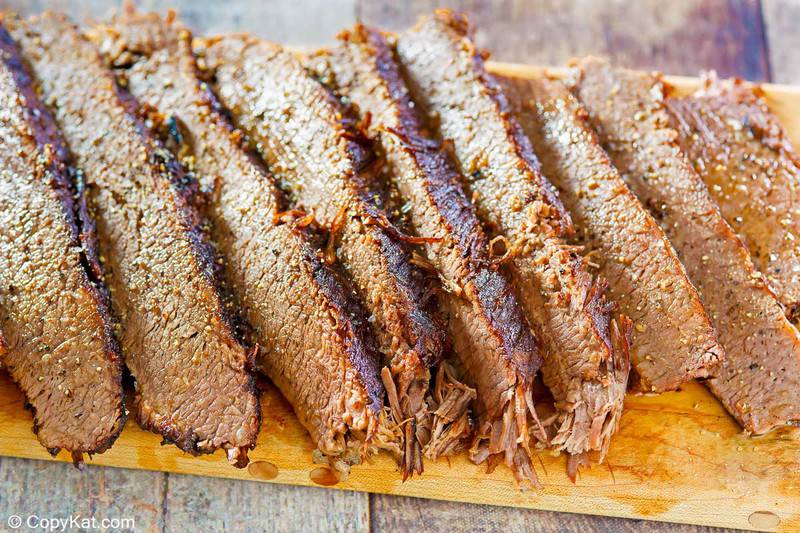brisket slices on a cutting board