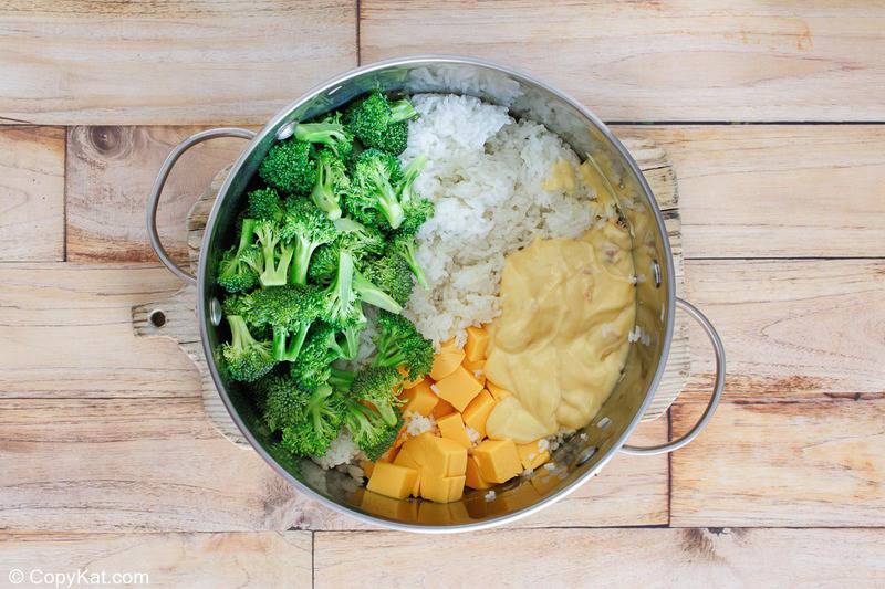 broccoli cheese rice casserole ingredients in a pot