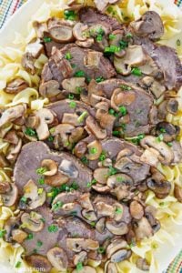 homemade Cracker Barrel mushroom pot roast and noodles on a platter