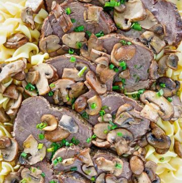 homemade Cracker Barrel mushroom pot roast and noodles on a platter