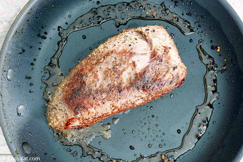 seared roast beef in a skillet