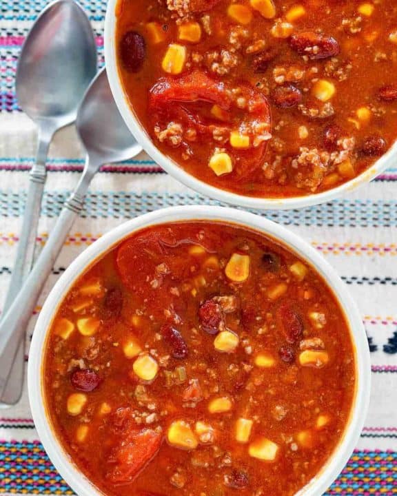 overhead view of two bowls of taco soup