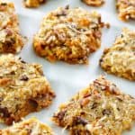 Hello Dolly Cookie Bars on parchment paper