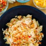 overhead view of Instant Pot Salsa Chicken in a black bowl