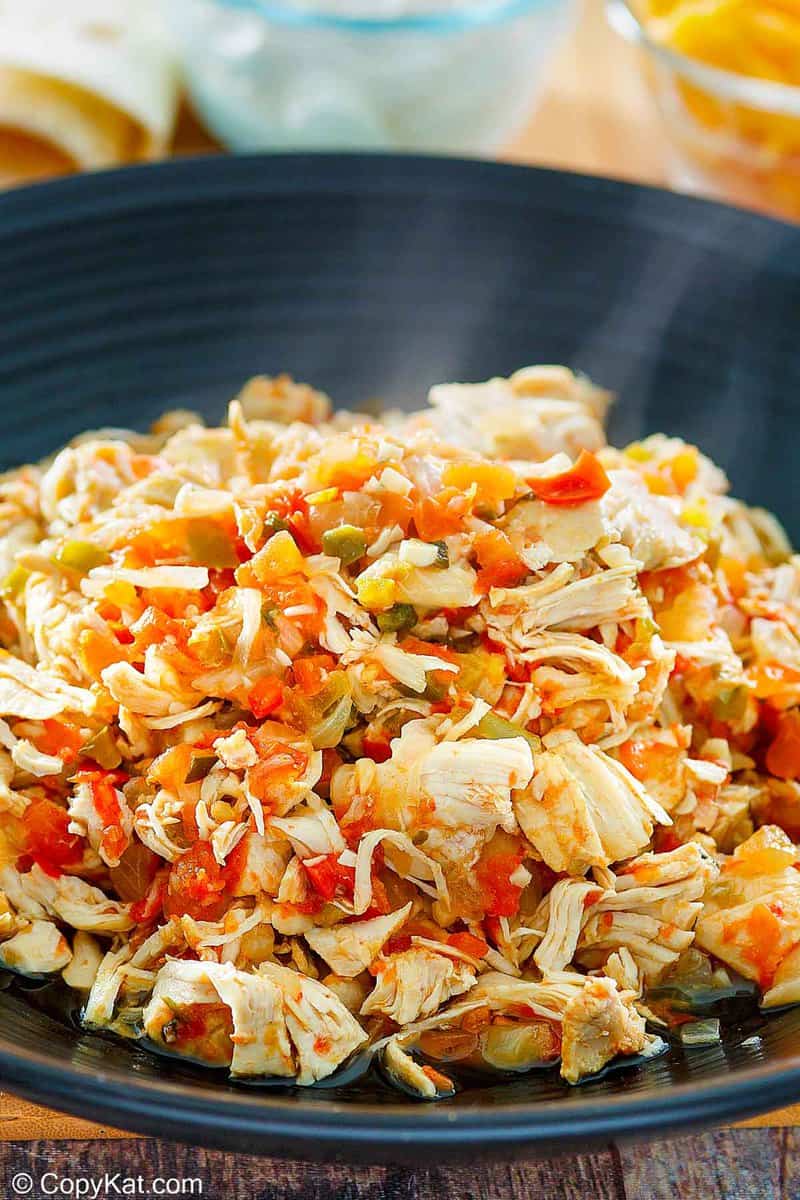 Instant Pot salsa chicken in a black bowl