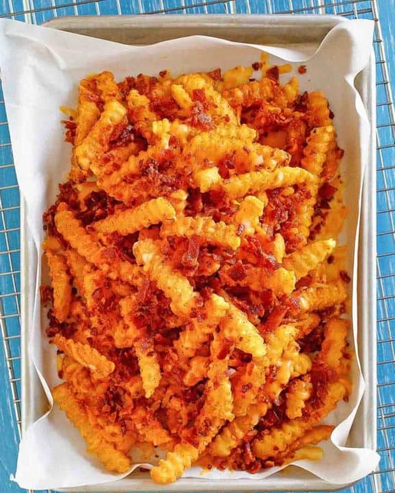 Homemade Outback Steakhouse Aussie Fries on a baking sheet