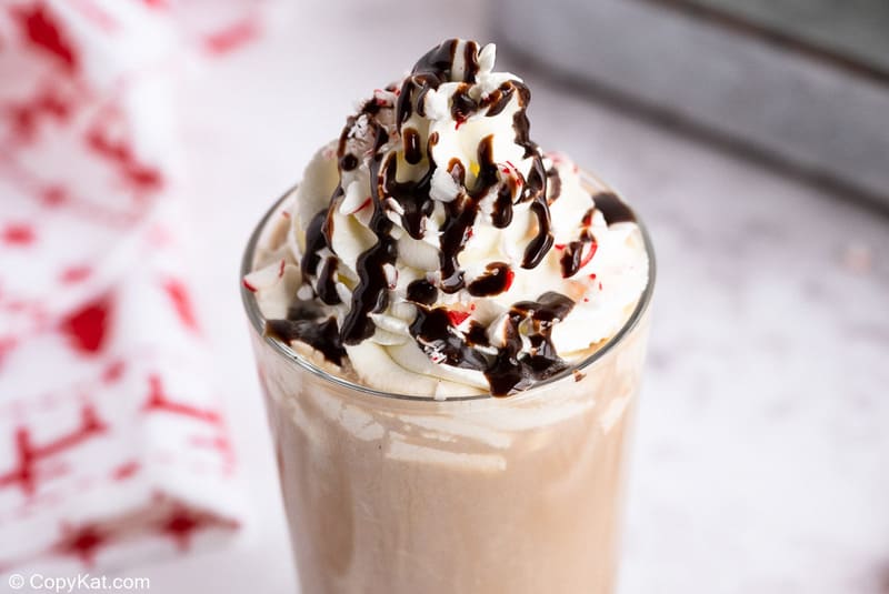 Homemade Starbucks Peppermint Mocha with whipped cream, chocolate syrup, and crushed peppermint candy