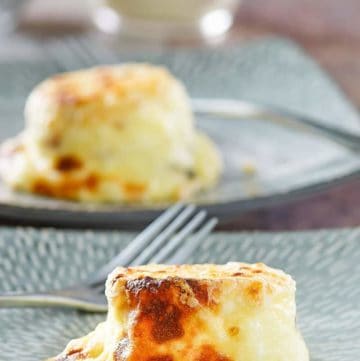 homemade Starbucks egg bites with bacon and gruyere cheese on plates