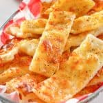 homemade Little Caesar's Italian Cheese Breadsticks in a basket