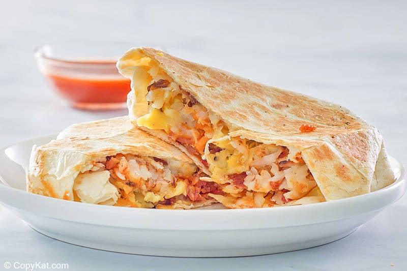 homemade Taco Bell Breakfast Crunchwrap with bacon on a plate