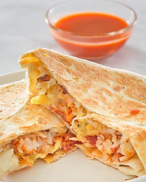 homemade Taco Bell Breakfast Crunchwrap and taco sauce