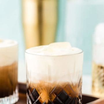 White Russian drink on a serving tray
